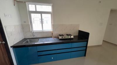 Kitchen Image of 600 Sq.ft 2 BHK Apartment / Flat for rent in Kolte Patil Life Republic Sector R16 16th Avenue Arezo M Building, Marunji Pune for Rs. 25000