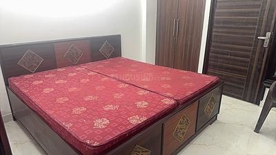 Bedroom Image of 420 Sq.ft 1 BHK Builder Floor for rent in Rajpur Khurd Village New Delhi for Rs. 25000