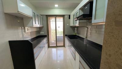 Kitchen Image of 950 Sq.ft 2 BHK Apartment / Flat for sale in Hiranandani Estate Thane for Rs. 13500000