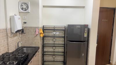 Kitchen Image of 705 Sq.ft 1 BHK Apartment / Flat for sale in Lodha Belmondo, Gahunje Pune for Rs. 7700000