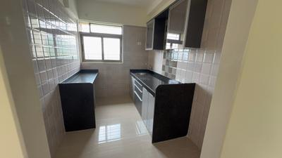 Kitchen Image of 1250 Sq.ft 2.5 BHK Apartment / Flat for rent in Vishesh Balaji Symphony, Panvel Navi Mumbai for Rs. 29000