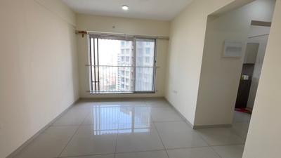Living Room Image of 630 Sq.ft 1 BHK Apartment / Flat for sale in Godrej Nest, Kandivali East Mumbai for Rs. 11900000