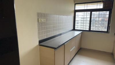 Kitchen Image of 1070 Sq.ft 2 BHK Apartment / Flat for sale in Kalpataru Splendour, Wakad Pune for Rs. 10300000