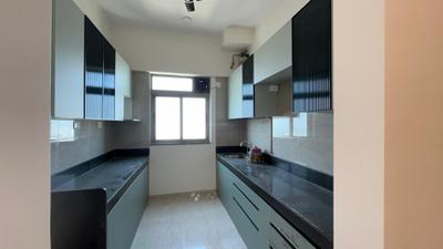 Kitchen Image of 988 Sq.ft 2 BHK Apartment / Flat for sale in Sheth Auris Serenity, Malad West Mumbai for Rs. 27800000