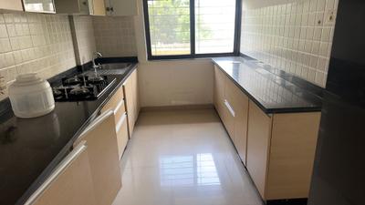 Kitchen Image of 1090 Sq.ft 2 BHK Apartment / Flat for sale in Kalpataru Splendour, Wakad Pune for Rs. 9950000