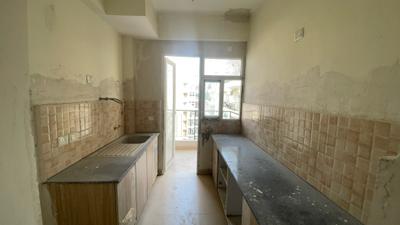 Kitchen Image of 1200 Sq.ft 3 BHK Apartment / Flat for sale in Amrapali Crystal Homes Phase 1, Sector 76 Noida for Rs. 17807500