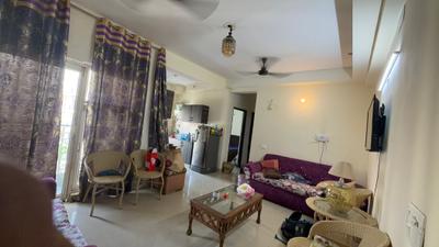 Living Room Image of 949 Sq.ft 2 BHK Apartment / Flat for rent in Gardenia Golf City, Sector 75 Noida for Rs. 35000