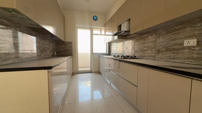 Kitchen Image of 2100 Sq.ft 4 BHK Apartment / Flat for sale in Shapoorji Pallonji JoyVille, Sector 102 Gurgaon for Rs. 32000000
