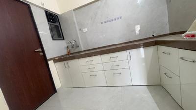 Kitchen Image of 900 Sq.ft 2.5 BHK Apartment / Flat for rent in Ten United Athashri, Lohegaon Pune for Rs. 25000