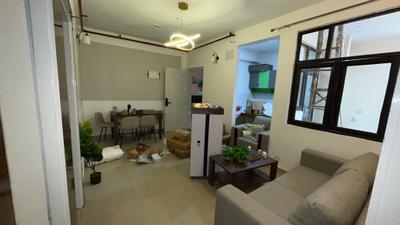 Living Room Image of 949 Sq.ft 2 BHK Apartment / Flat for sale in Charms Castle, Raj Nagar Extension Ghaziabad for Rs. 7100000