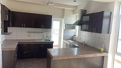 Kitchen Image of 2400 Sq.ft 3.5 BHK Apartment / Flat for sale in Raheja Atlantis, Sector 31 Gurgaon for Rs. 47000000