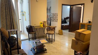 Living Room Image of 820 Sq.ft 2 BHK Apartment / Flat for rent in Amrapali Leisure Park, Noida Extension Greater Noida for Rs. 24000