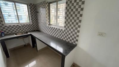 Kitchen Image of 980 Sq.ft 2 BHK Apartment / Flat for sale in Nayabad Kolkata for Rs. 4100000