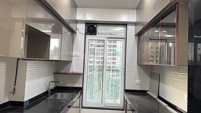 Kitchen Image of 850 Sq.ft 2 BHK Apartment / Flat for sale in Triumph Swastik, Malad West Mumbai for Rs. 23600000