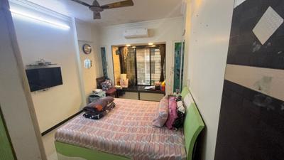 Bedroom Image of 890 Sq.ft 2 BHK Apartment / Flat for sale in Kandivali West Mumbai for Rs. 20500000