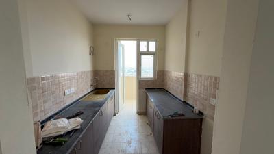 Kitchen Image of 1050 Sq.ft 2 BHK Apartment / Flat for sale in Amrapali Heartbeat City, Sector 107 Noida for Rs. 12547500