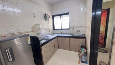 Kitchen Image of 850 Sq.ft 1 BHK Apartment / Flat for rent in Vasant Vihar Complax, Thane West Thane for Rs. 35000