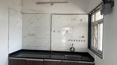 Kitchen Image of 1000 Sq.ft 2 BHK Apartment / Flat for rent in Sukhwani Pacific II, Thergaon Pune for Rs. 29000