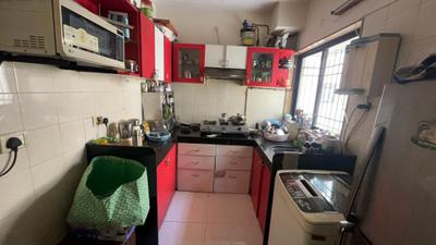 Kitchen Image of 850 Sq.ft 2 BHK Apartment / Flat for sale in Prajapati Park, Kopar Khairane Navi Mumbai for Rs. 16799999