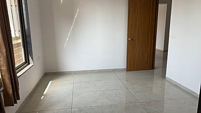 Bedroom Image of 900 Sq.ft 3 BHK Apartment / Flat for sale in Nakshtra Samved Dreams, Sargasan Gandhinagar for Rs. 8200000
