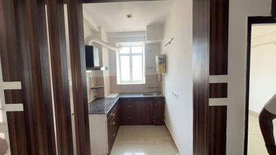 Kitchen Image of 900 Sq.ft 2 BHK Apartment / Flat for sale in Alpine AIG Park Avenue, Noida Extension Greater Noida for Rs. 8500000