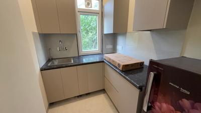 Kitchen Image of 550 Sq.ft 1 BHK Builder Floor for rent in Sector 51 Gurgaon for Rs. 40000