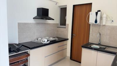 Kitchen Image of 1076 Sq.ft 2 BHK Apartment / Flat for rent in Geras Planet Of Joy, Upper Kharadi Pune for Rs. 38000