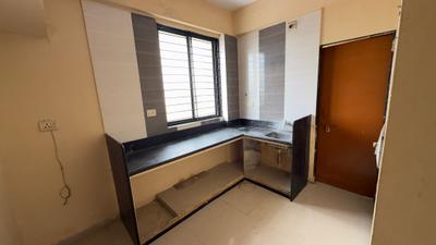 Kitchen Image of 1215 Sq.ft 2 BHK Apartment / Flat for rent in Mahadev Takshshila Mahadev Green, Amraiwadi Ahmedabad for Rs. 12000