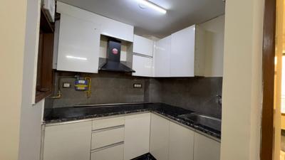 Kitchen Image of 750 Sq.ft 2 BHK Apartment / Flat for rent in Chhattarpur New Delhi for Rs. 25000