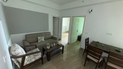 Living Room Image of 860 Sq.ft 2 BHK Apartment / Flat for sale in Migsun Vilaasa, Eta II Greater Noida for Rs. 6200000
