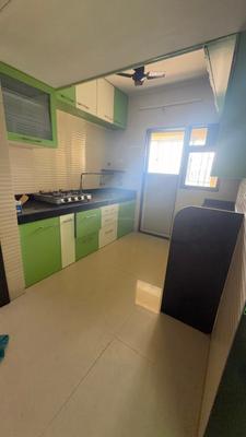 Kitchen Image of 585 Sq.ft 1 BHK Apartment / Flat for rent in Cosmos Jewels, Thane West Thane for Rs. 25000