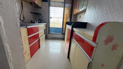 Kitchen Image of 1060 Sq.ft 2 BHK Apartment / Flat for sale in Unique Aurum, Mira Road East Mira Bhayandar for Rs. 12000000