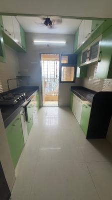 Kitchen Image of 585 Sq.ft 1 BHK Apartment / Flat for rent in Cosmos Jewels, Thane West Thane for Rs. 25000