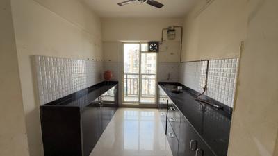Kitchen Image of 810 Sq.ft 2 BHK Apartment / Flat for rent in Rosa Gardenia, Kasarvadavali Thane for Rs. 27000