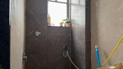 Bathroom Image of 615 Sq.ft 1 BHK Apartment / Flat for sale in Saakshi Parvatara, Kiwale Pune for Rs. 5500000