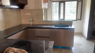 Kitchen Image of 1200 Sq.ft 2 BHK Apartment / Flat for rent in Domlur Layout Bengaluru for Rs. 50000