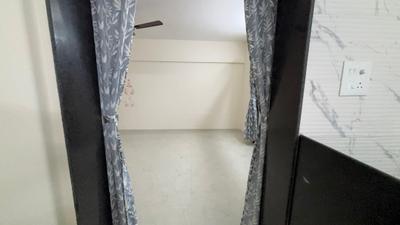 Living Room Image of 950 Sq.ft 2 BHK Apartment / Flat for rent in JND Wisteria, Ambegaon Budruk Pune for Rs. 22000