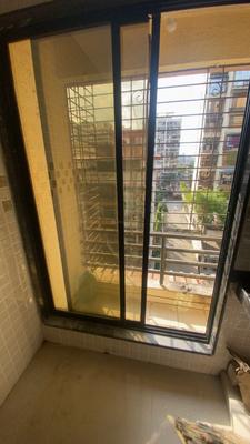 Balcony Image of 920 Sq.ft 2 BHK Apartment / Flat for rent in Dwisha Developers Dwisha Height, Taloja Navi Mumbai for Rs. 18000