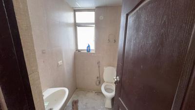 Bathroom Image of 584 Sq.ft 1 BHK Apartment / Flat for rent in Aditya Urban Homes Phase 1A, Bamheta Village Ghaziabad for Rs. 9500