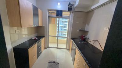 Kitchen Image of 900 Sq.ft 1 BHK Apartment / Flat for rent in Hiranandani Flora, Hiranandani Estate Thane for Rs. 33000