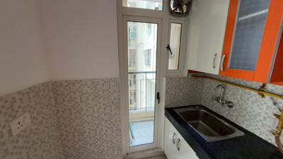 Kitchen Image of 858 Sq.ft 2 BHK Apartment / Flat for sale in Aditya Luxuria Estate, Bamheta Village Ghaziabad for Rs. 5900000