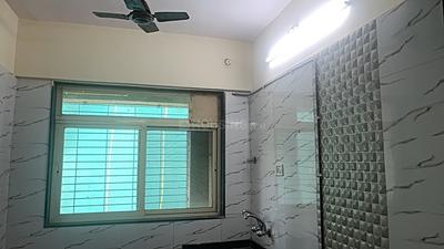 Kitchen Image of 980 Sq.ft 2 BHK Apartment / Flat for rent in Mohan Willows I, Badlapur East Badlapur for Rs. 11800