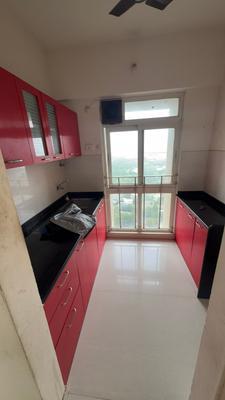 Kitchen Image of 664 Sq.ft 1 BHK Apartment / Flat for rent in Vijay Orovia, Hiranandani Estate Thane for Rs. 23000