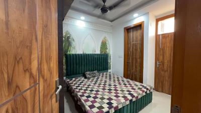 Bedroom Image of 650 Sq.ft 2 BHK Builder Floor for rent in Dwarka Mor New Delhi for Rs. 23500