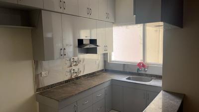 Kitchen Image of 600 Sq.ft 2 BHK Apartment / Flat for rent in Pivotal Riddhi Siddhi, Sector 99 Gurgaon for Rs. 20000