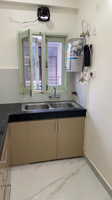 Kitchen Image of 900 Sq.ft 2 BHK Builder Floor for rent in Palam Vihar Extension Gurgaon for Rs. 26000
