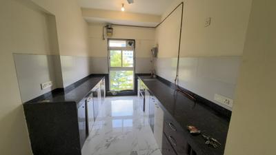 Kitchen Image of 950 Sq.ft 2 BHK Apartment / Flat for rent in Raheja Ridgewood, Goregaon East Mumbai for Rs. 87000