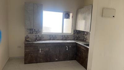 Kitchen Image of 800 Sq.ft 2 BHK Apartment / Flat for rent in Pivotal Riddhi Siddhi, Sector 99 Gurgaon for Rs. 19000