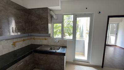 Kitchen Image of 840 Sq.ft 2 BHK Apartment / Flat for sale in Aditya Urban Homes, Bamheta Village Ghaziabad for Rs. 5350000