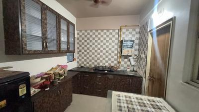 Kitchen Image of 900 Sq.ft 2 BHK Apartment / Flat for rent in Armaan Nandanvan, Narolgam Ahmedabad for Rs. 17000